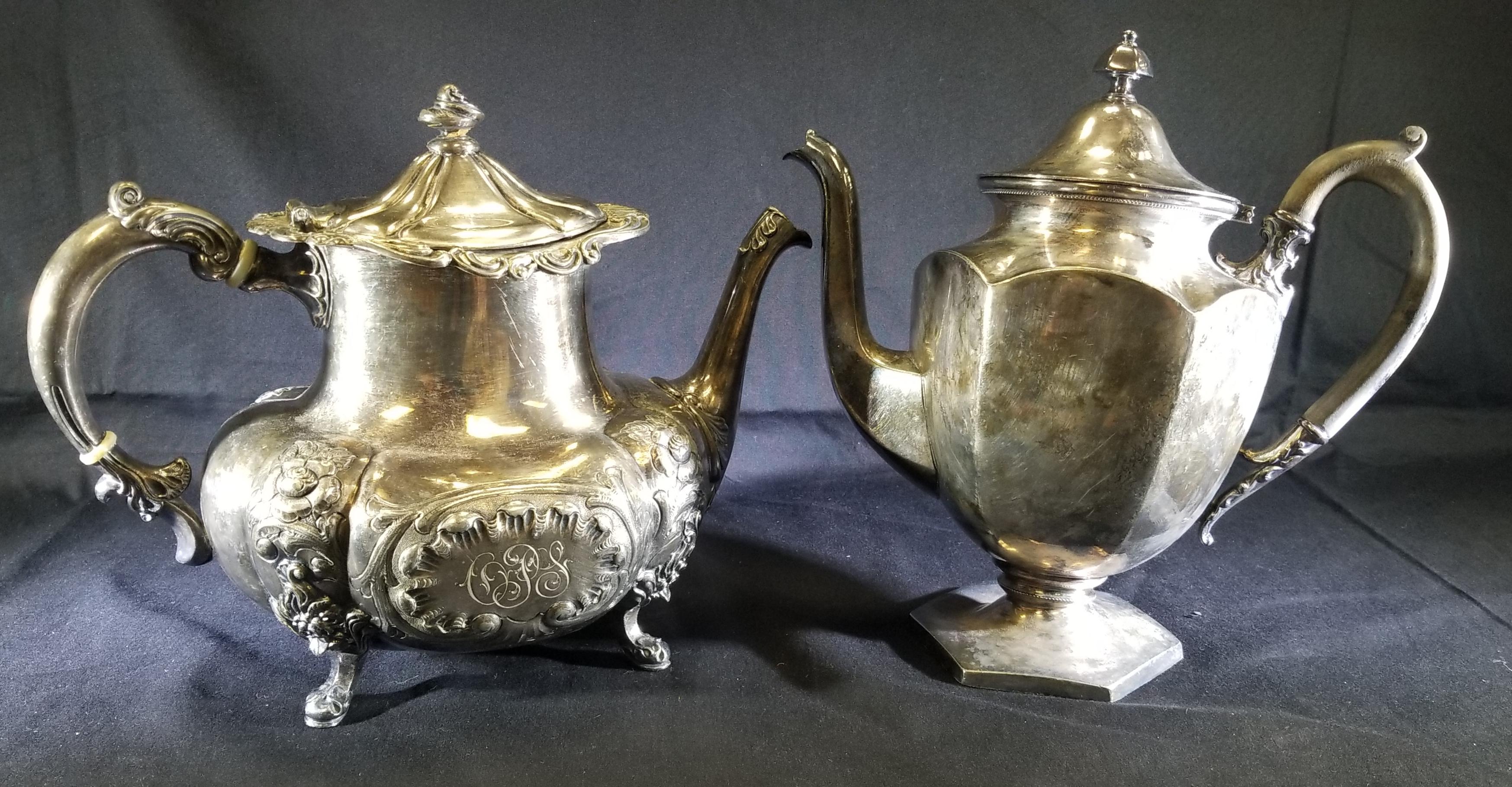 Lot 238: Silver Colored Coffee Pot (base bent); Silver Colored Tea Pot